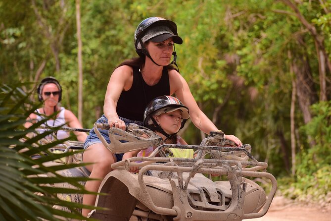 Tulum Adrenaline Tour ATV Ziplines and Cenote Swim Day - Rappelling into an underground cenote