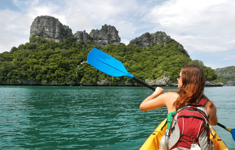 Vang Vieng: Day Tour with Kayaking, Ziplining, and Rafting - Tubing through Tham Chang Cave