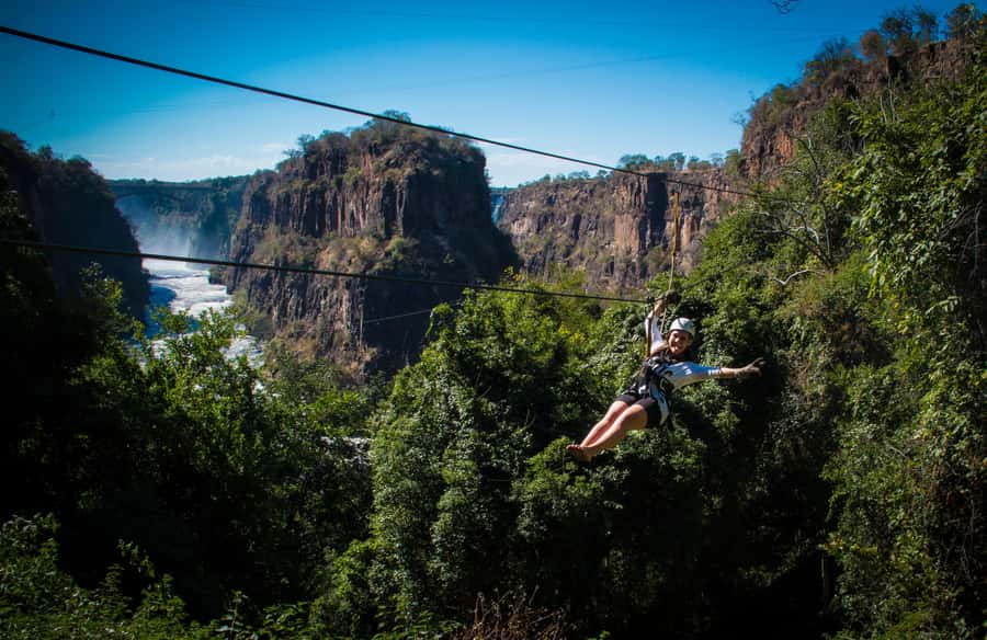 Victoria Falls: Canopy Tour with Transfers - Nine slides through the hardwood forest