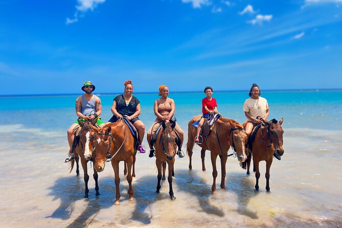 Zipline, Dunn’s River Falls, Bamboo Rafting & Horseback Ride Tour - Horseback riding and swimming in St. Ann’s Bay