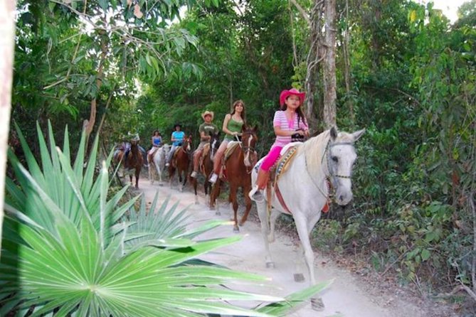 Ziplining and Horseback Riding Experience from Cancun and Playa del Carmen - Cooling off in a cenote